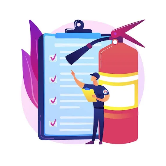 Fire safety inspector reviewing a compliance checklist next to a fire extinguisher